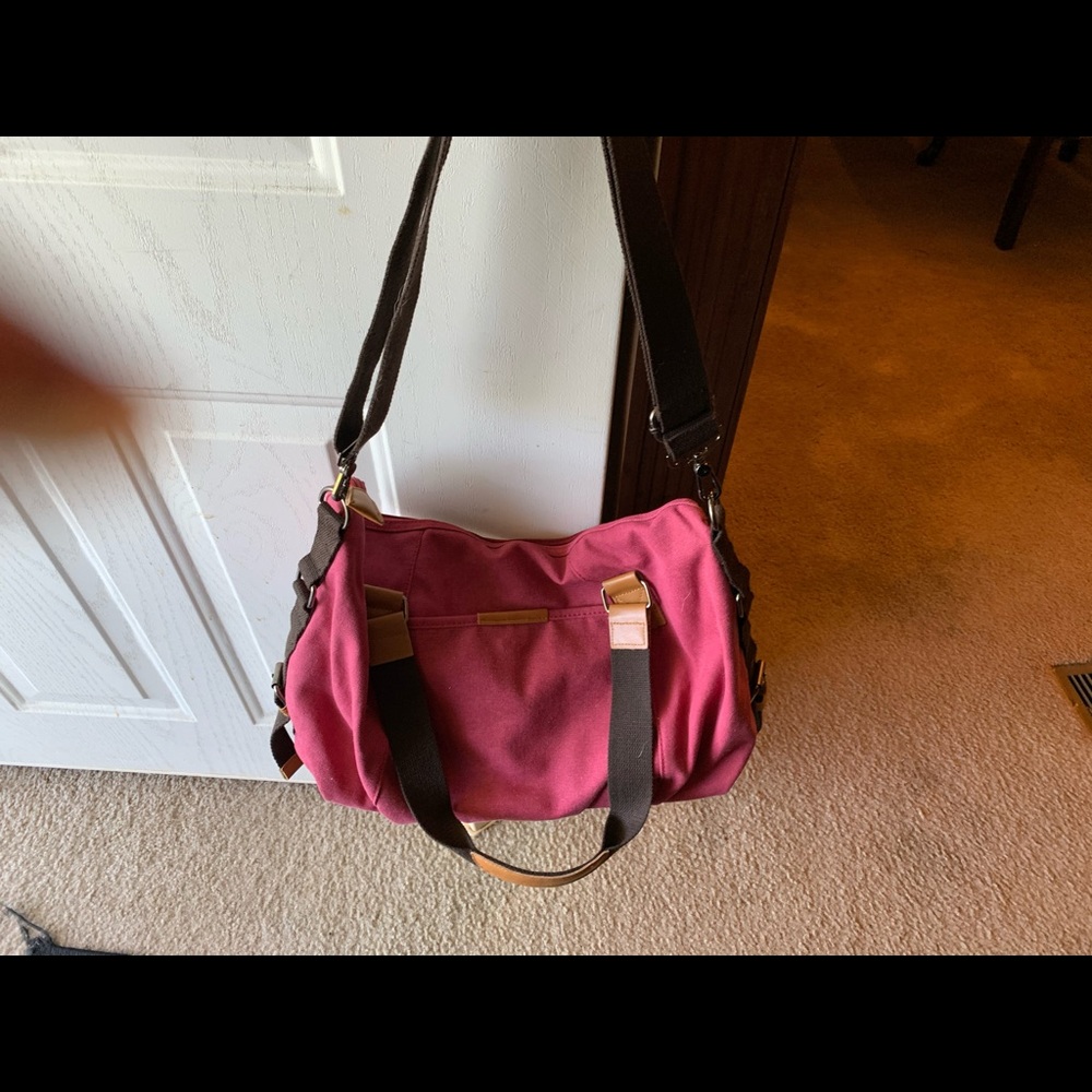 Red handbag K brand.